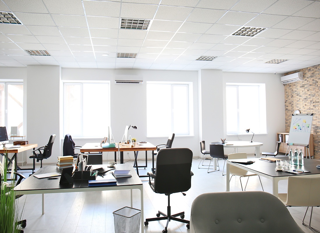 Long Prairie, MN - Office Interior With Tables and Armchairs